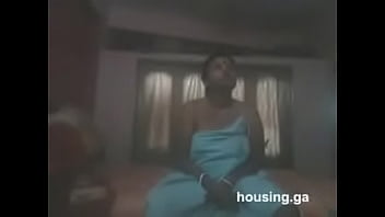 indian aunty doing oily massage to man body