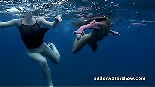 seachfully clothed mom and aunt fuck son in the swimming pool