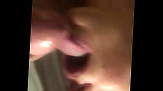close up with asian taking cock in mouth