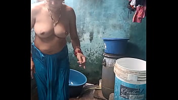 india aunty bathing in river