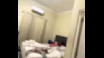 mom son share bed in hotel
