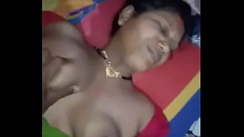 woman tied up while nipples are sucked and tickled